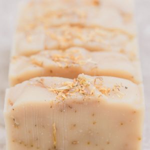 5 bars of handmade organic amber lemongrass soap with essential oils of lemongrass, clary sage and a blend of amber colored with calendula petals