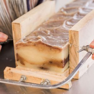 Lanae Rhoads cutting sweet cedarwood handmade organic bar soap