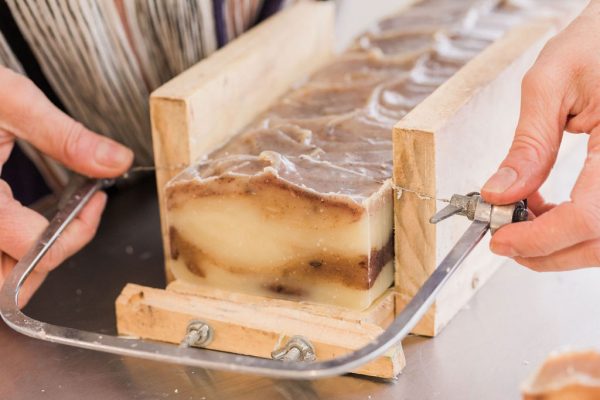 Lanae Rhoads cutting sweet cedarwood handmade organic bar soap