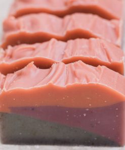 4 bars of lavender sunset bar soap with organic essential oils of lavender, orange and ylang ylang made with rosehip powder and clays for color