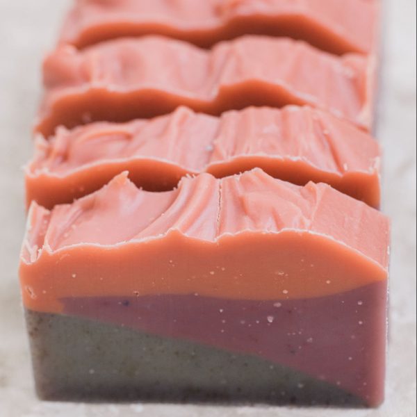 4 bars of lavender sunset bar soap with organic essential oils of lavender, orange and ylang ylang made with rosehip powder and clays for color