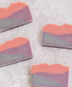 Lavender Sunset soap with 3 colors made with natural colorants to look like a sunset in soap