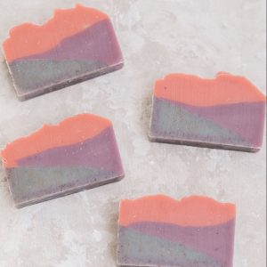 Lavender Sunset soap with 3 colors made with natural colorants to look like a sunset in soap