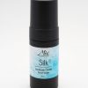 A foaming silk face wash in a sleek black bottle, that will dispense airy, luxurious foam to cleanse skin gently while leaving the microbiome intact