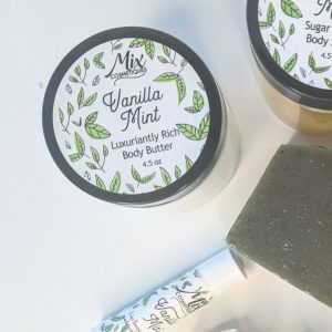 Vanilla Mint Luxuriantly Rich Body Butter pictured with Vanilla Mint Body Polish, Handmade Bar Soap and Lip Balm