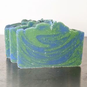 three bars of organic earth and water soap made with patchouli and kaffir lime essential oils a green and blue swirl made with in the pot swirl cold process soap method
