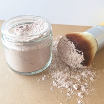 dry shampoo on applicator brush and sprinkled on paper fresh, organic, non-toxic ingredients