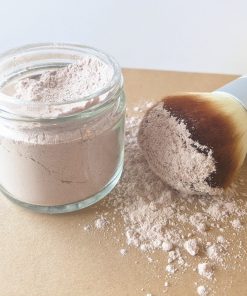 dry shampoo on applicator brush and sprinkled on paper fresh, organic, non-toxic ingredients