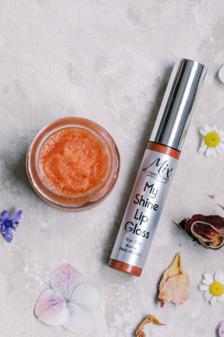 Organic Fresh Berry Lip Scrub with My Shine Lip Gloss in a Set with flower petals