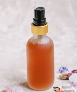 organic, plant-based facail toner in a frosted spray bottle to display for a DIY facial toner workshop where they will make their own with locally sourced materials and organic ingredients