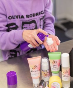 Hydrating Cucumber Facial Cleanser in a hand to see how it works with the rest of the glow line showing in the photo