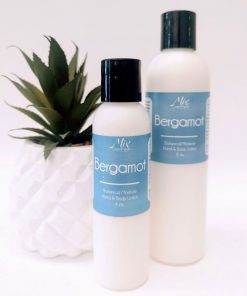 Organic bergamot hand and body lotion in glass bottle with natural ingredients for soft, hydrated skin