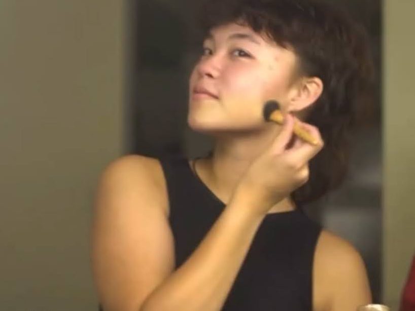 performer applying clean custom performance foundation before a broadway performance